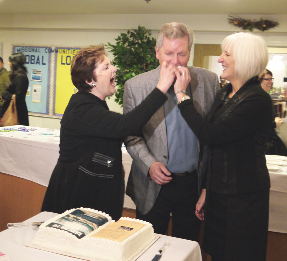 Carollyne, Dave and Marj celebrate with some cake