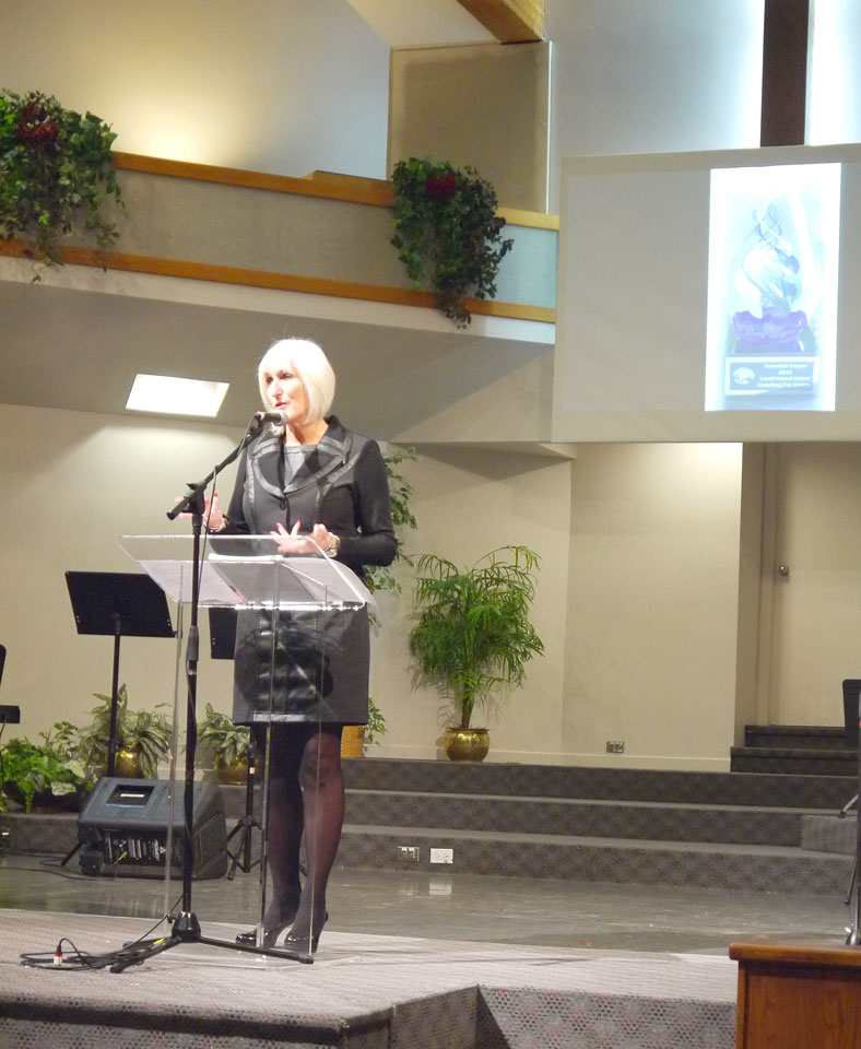 Marj at the podium